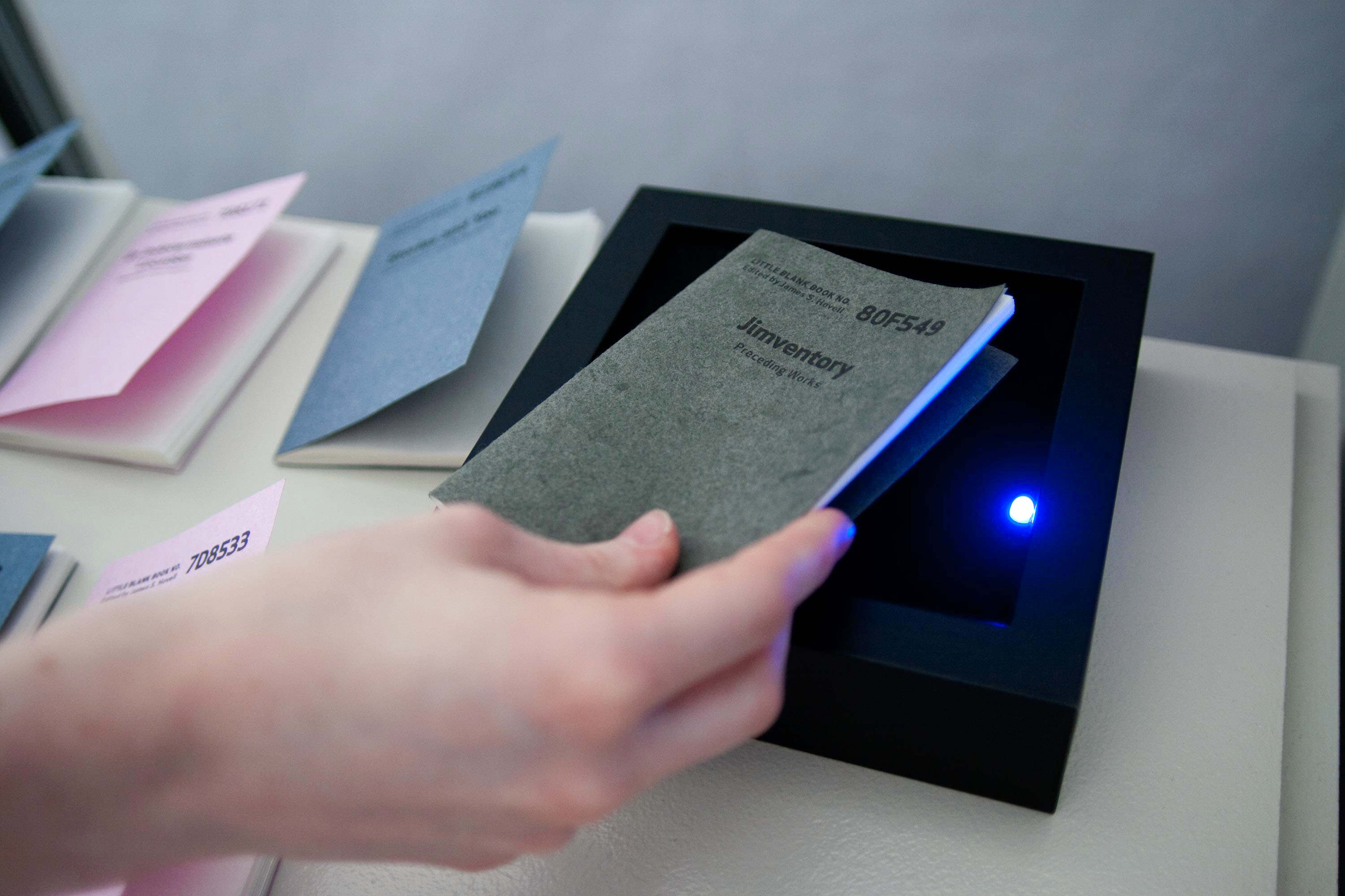 Place the little book over scanner.