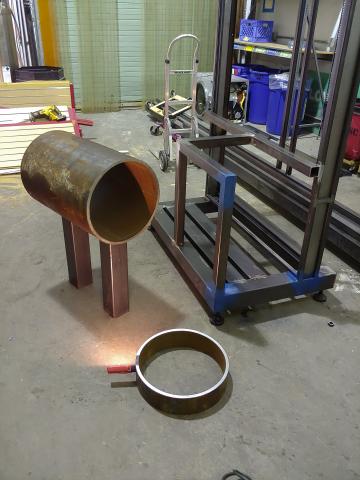Pipe, frame, and flat lay prior to assembly.
